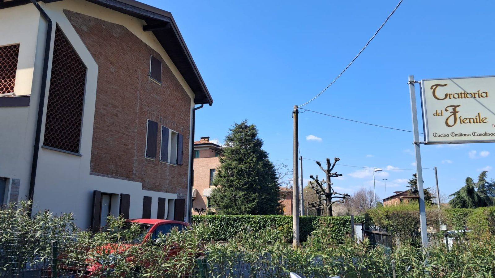 Insegna della Trattoria del Fienile da Rudy, cucina emiliana casalinga a Castelnuovo Rangone vicino a Modena